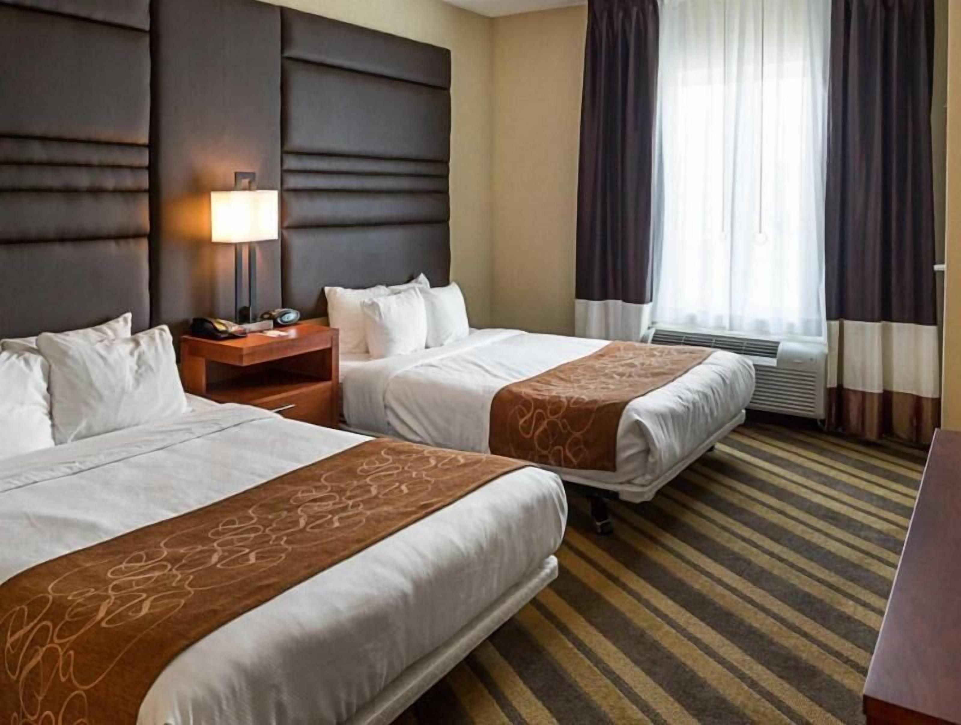 Premium bedding, desk, blackout drapes, iron/ironing board