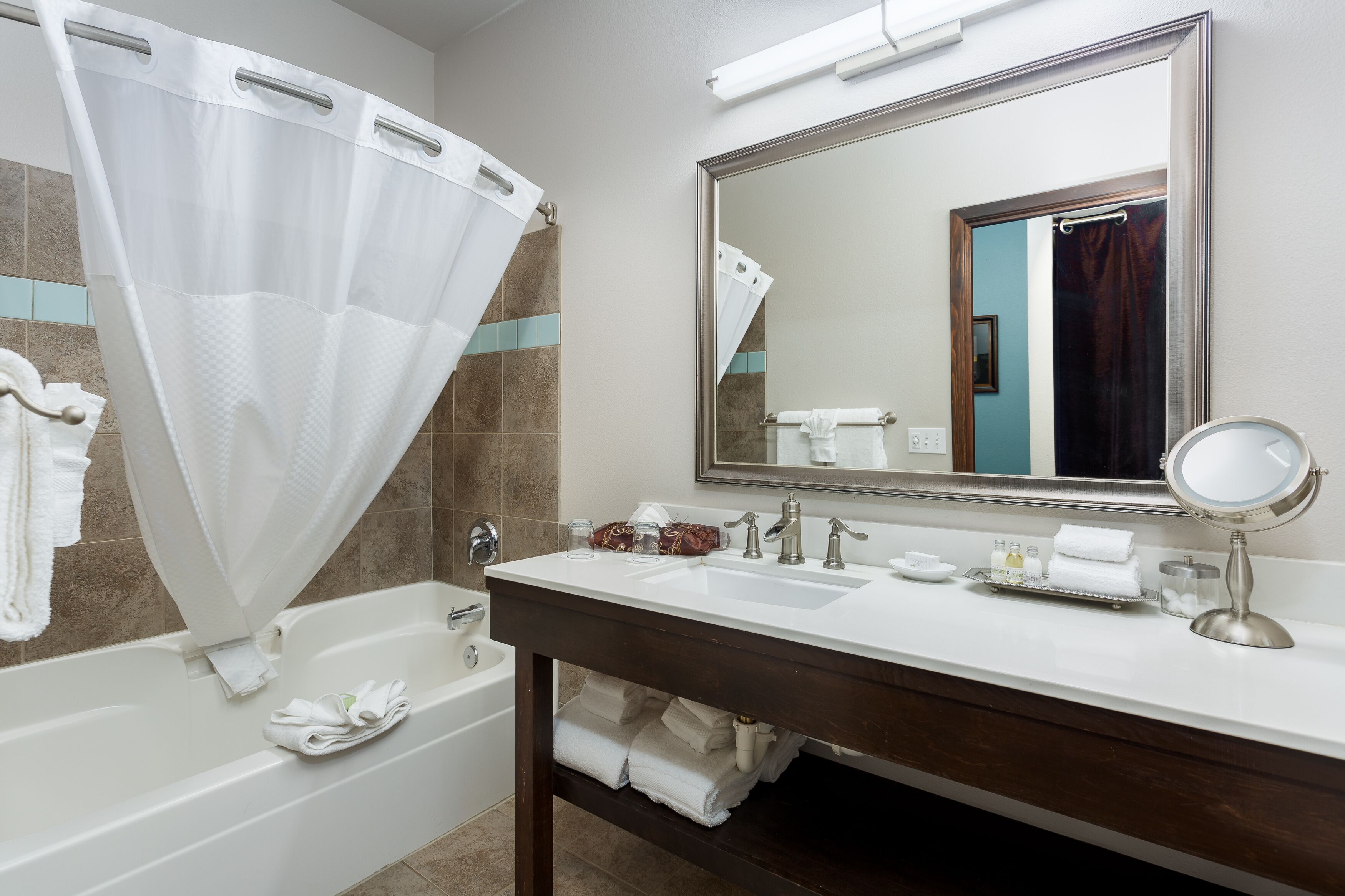 rainfall showerhead, designer toiletries, hair dryer, bathrobes