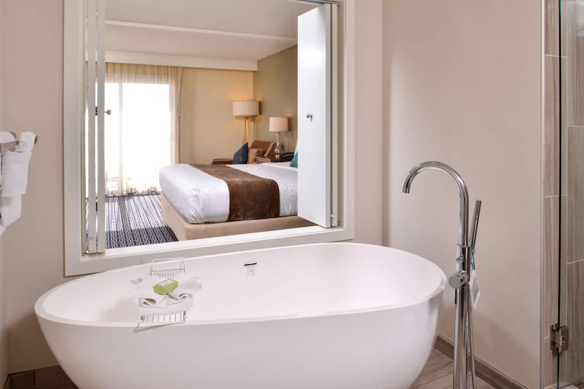 suite, 1 king bed (lighthouse suite) | bathroom | rainfall showerhead, designer toiletries, hair dryer, bathrobes