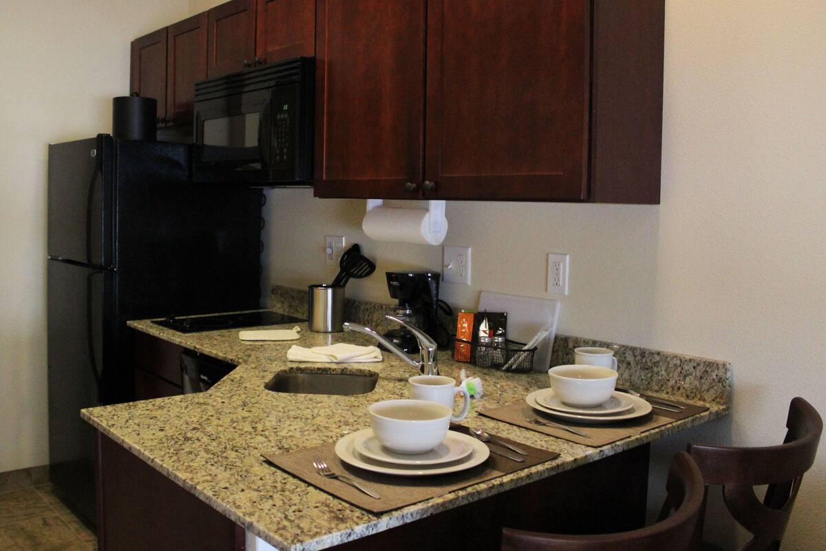 studio suite (must check-in before 9 pm) | private kitchenette | full-sized fridge, microwave, stovetop, dishwasher