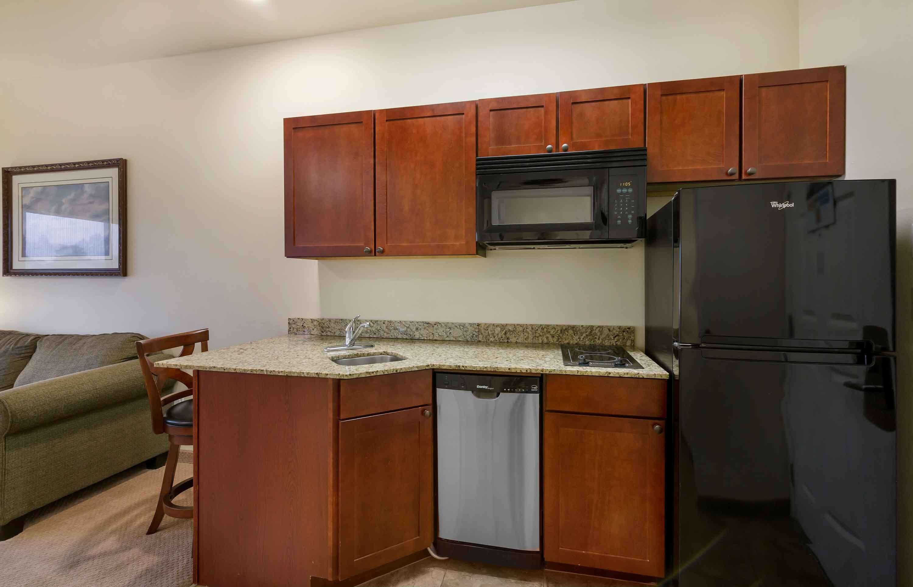 deluxe studio, 1 queen bed, non smoking, refrigerator & microwave | private kitchen | full-sized fridge, microwave, stovetop, dishwasher