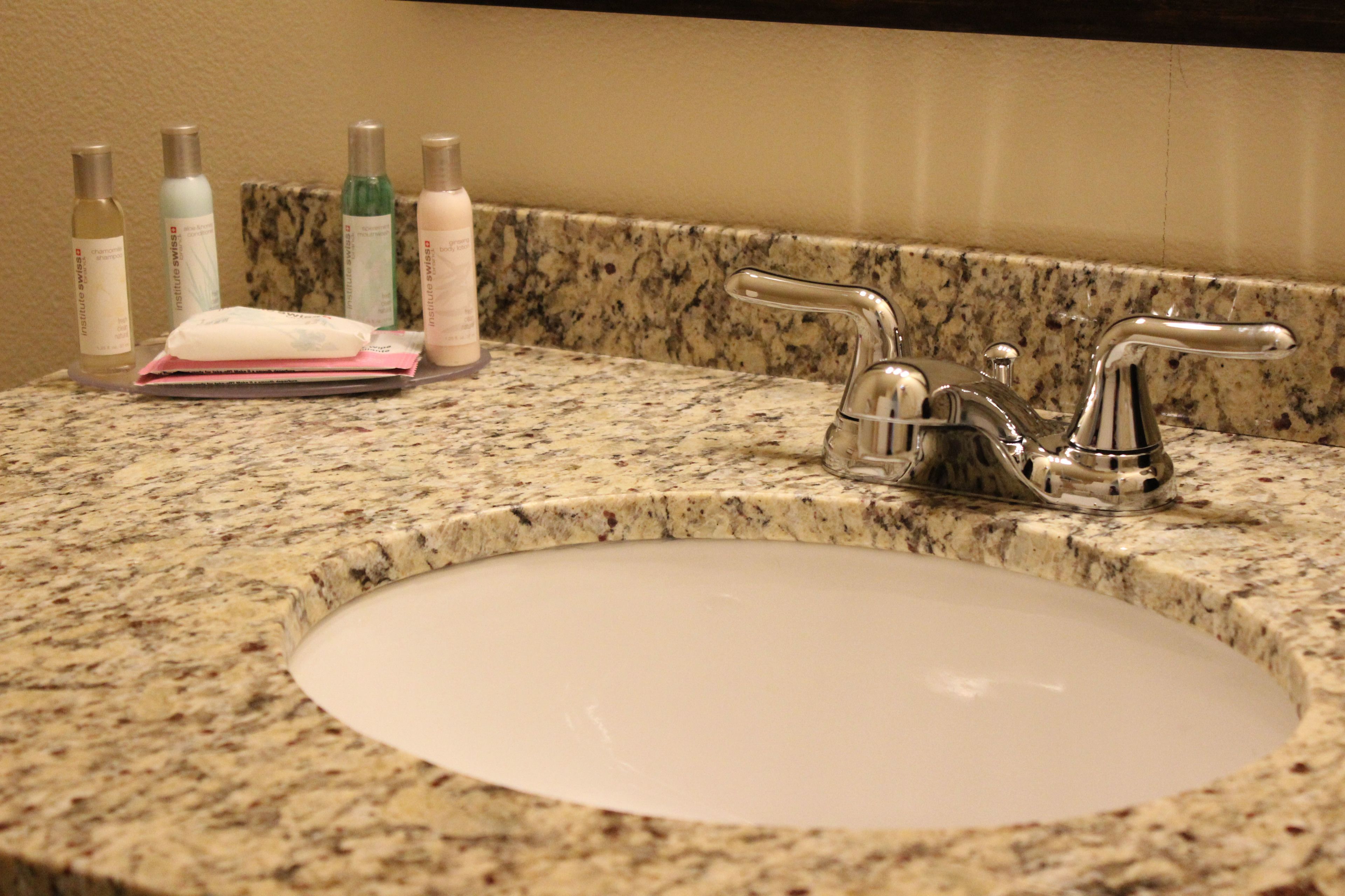 studio suite (must check-in before 9 pm) | bathroom sink