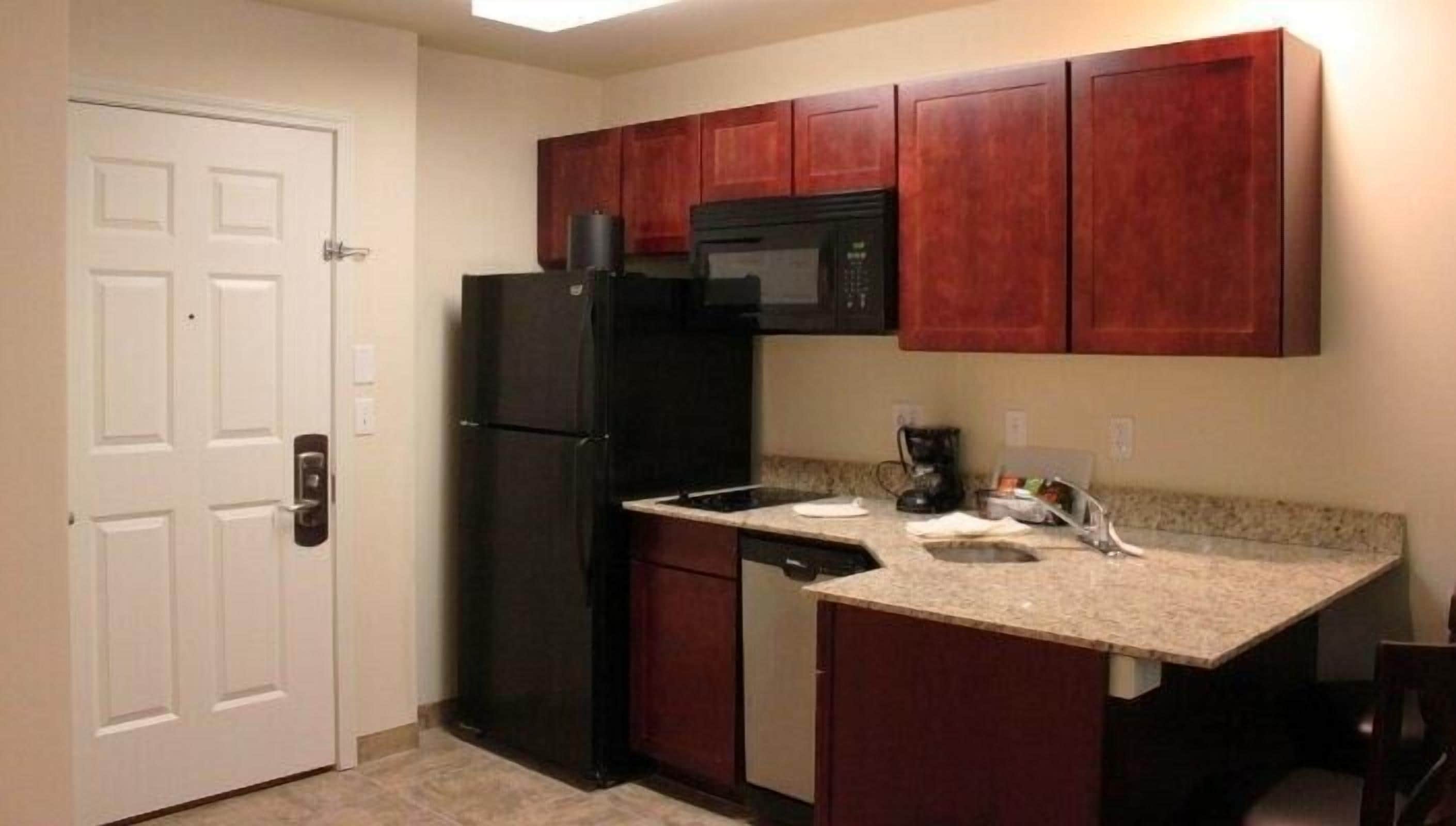 studio suite (must check-in before 9 pm) | private kitchen | full-sized fridge, microwave, stovetop, dishwasher