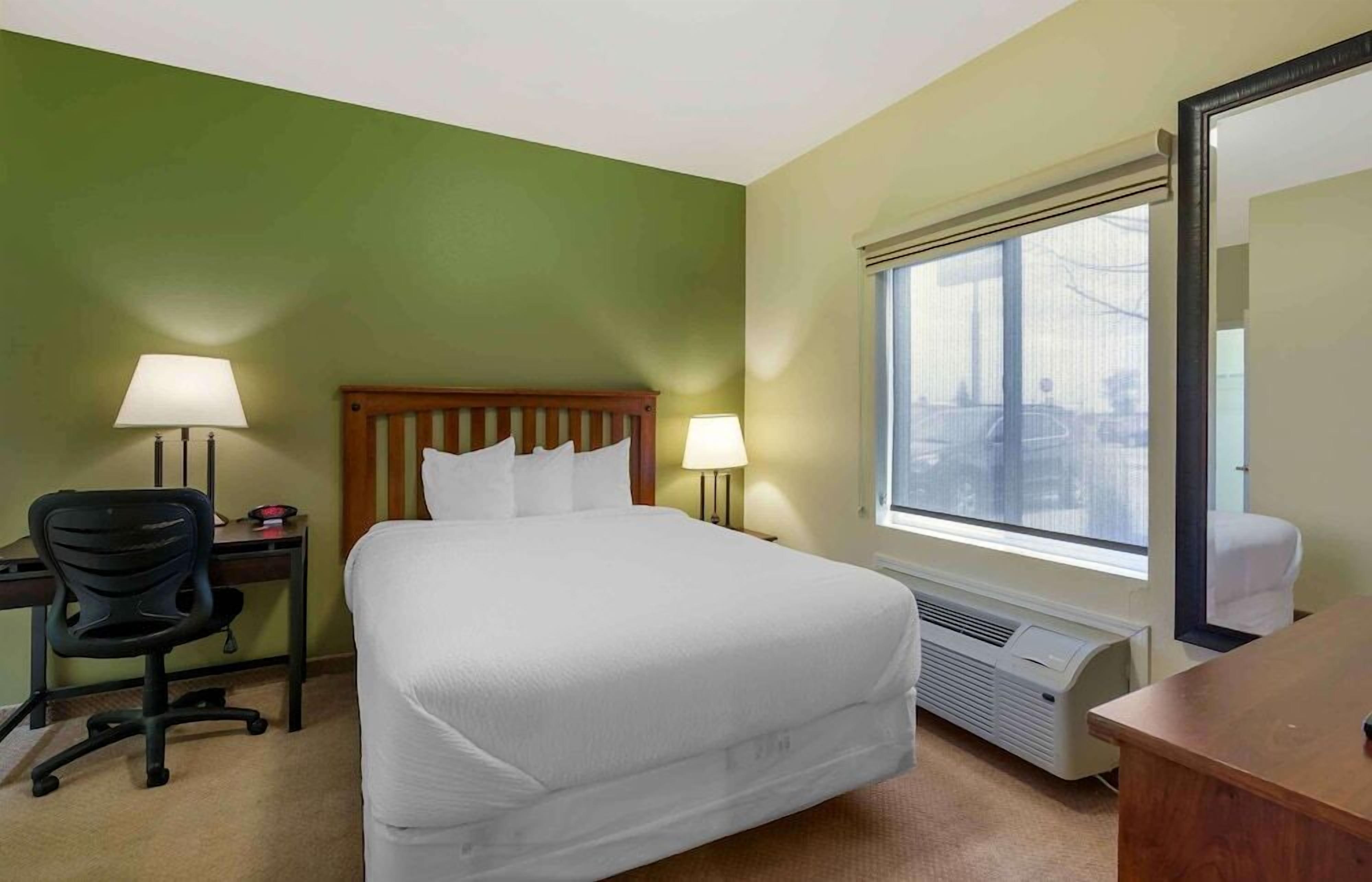 Pillow-top beds, desk, laptop workspace, blackout curtains