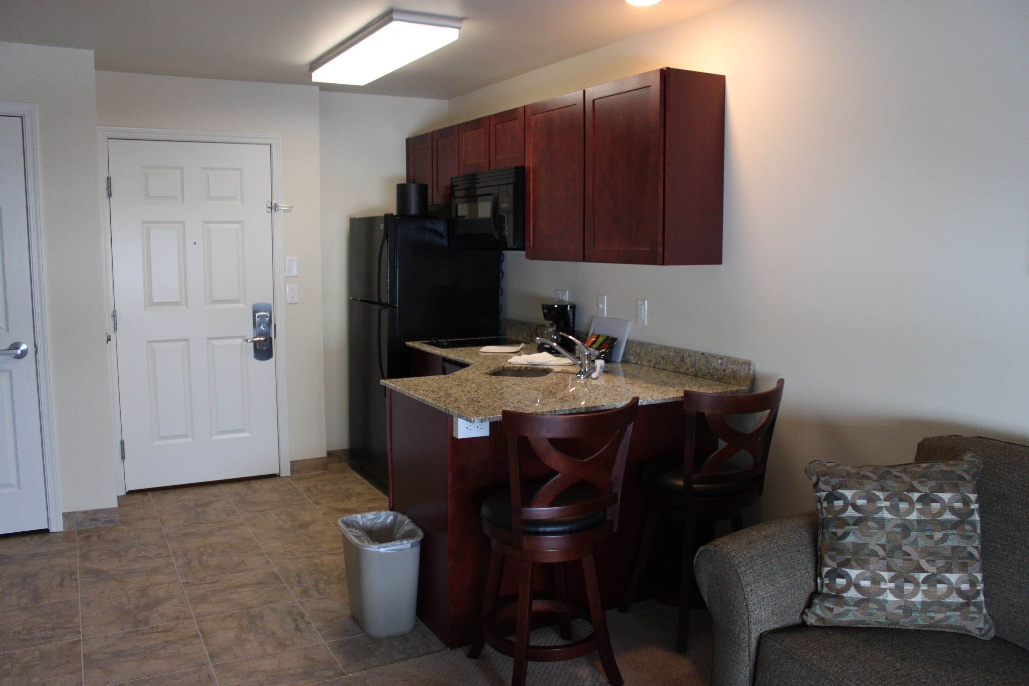 suite, 1 bedroom | private kitchen | full-sized fridge, microwave, stovetop, dishwasher