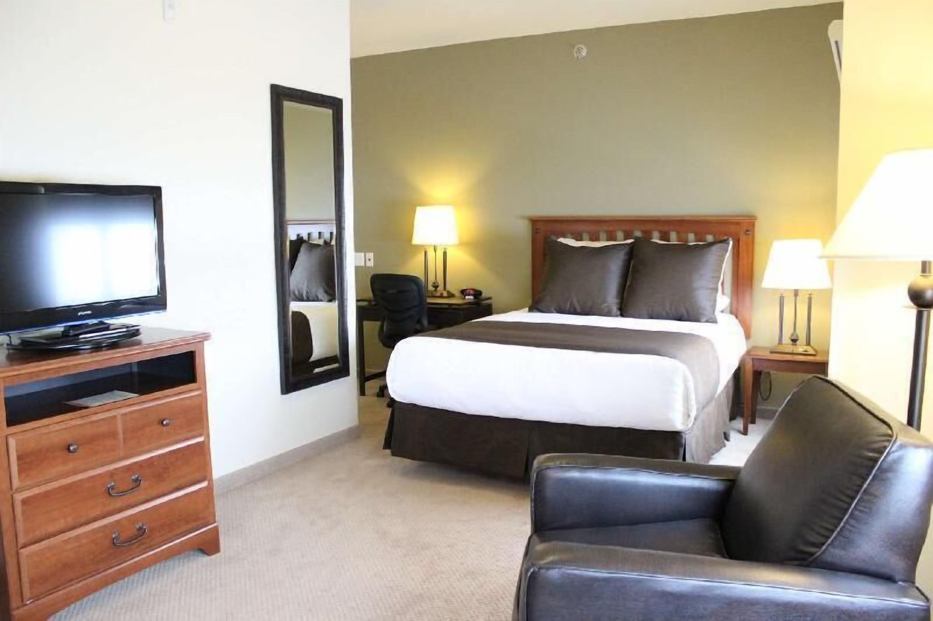 Pillow-top beds, desk, laptop workspace, blackout curtains