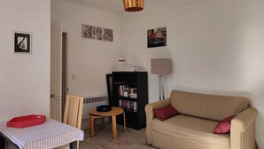 Departamento, 1 habitación | Área de sala de estar
