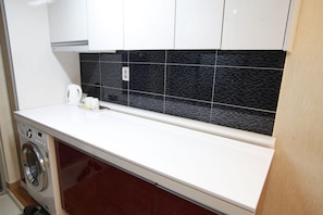 Blackout drapes, iron/ironing board, rollaway beds, free WiFi