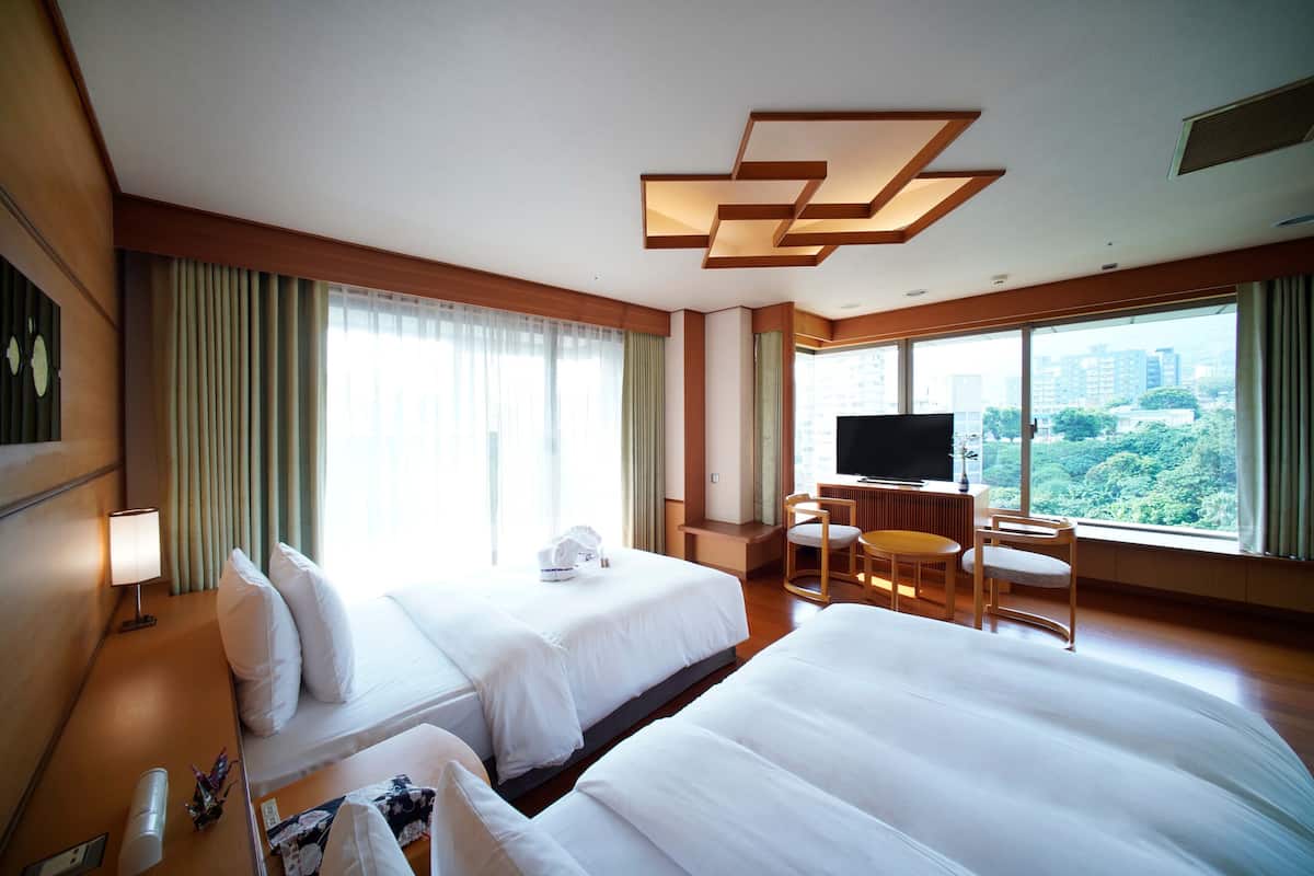 deluxe quadruple room, multiple beds, balcony, tower | 1 bedroom, premium bedding, down duvets, free minibar