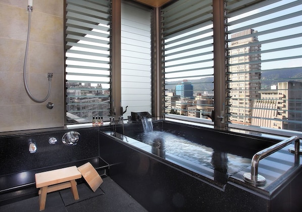 Deluxe Quadruple Room, Multiple Beds, Balcony, Tower | Bathroom | Separate bathtub and shower, spring water bathtub, free toiletries