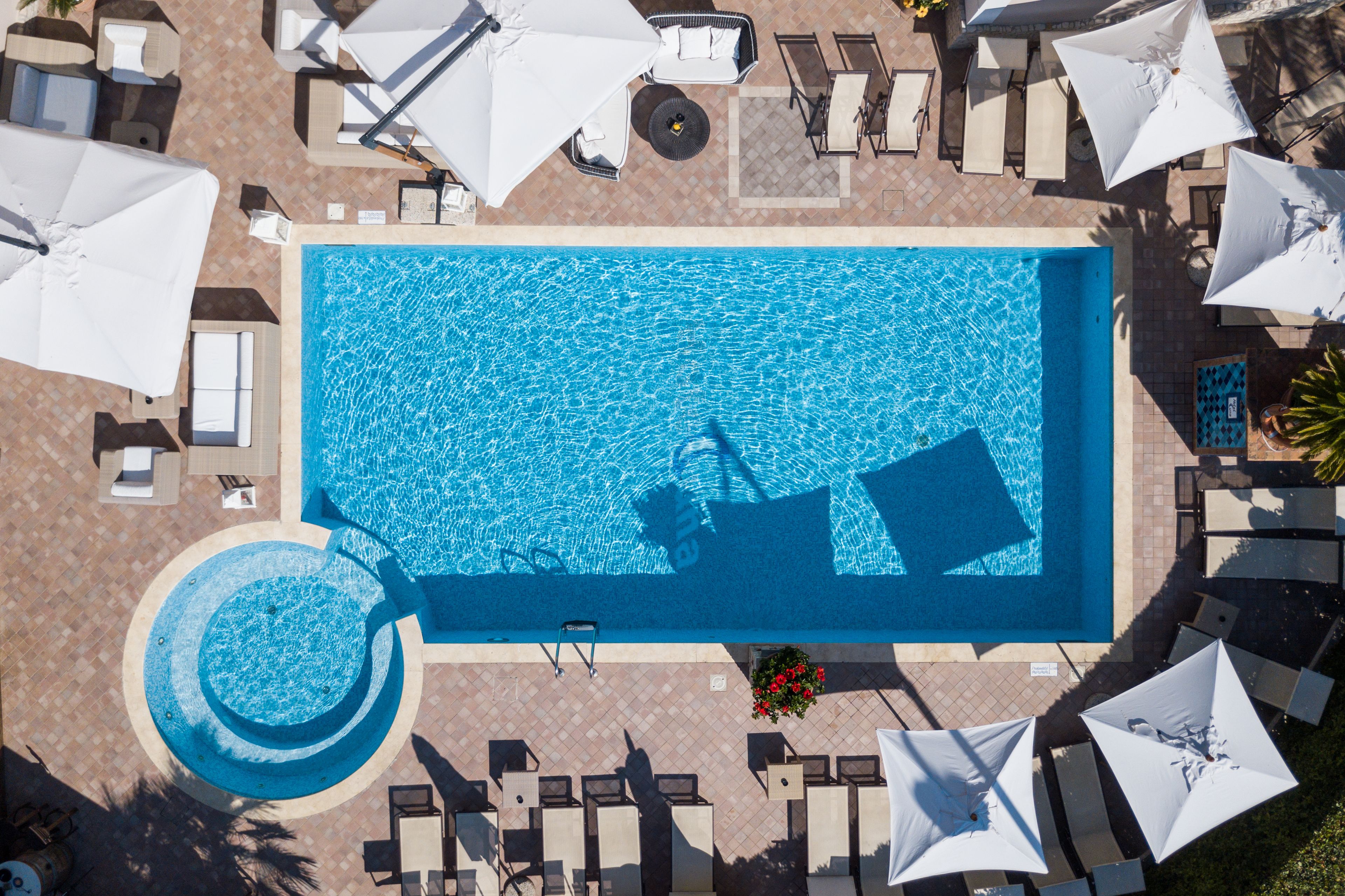 outdoor pool, pool umbrellas, pool loungers