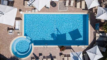 Outdoor pool, pool umbrellas, sun loungers