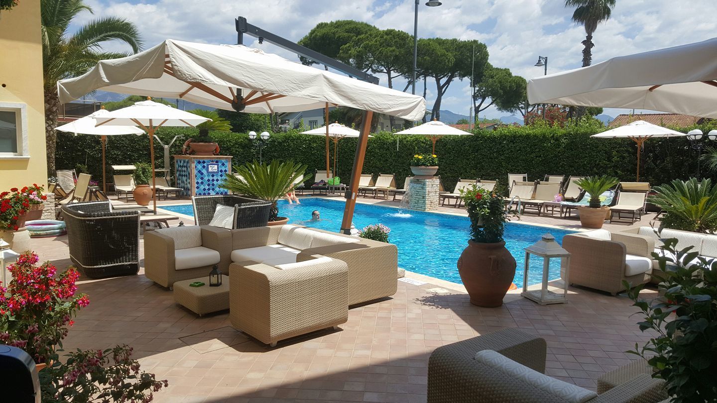 outdoor pool, pool umbrellas, pool loungers