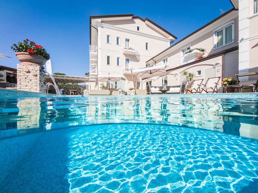 Outdoor pool, pool umbrellas, sun loungers