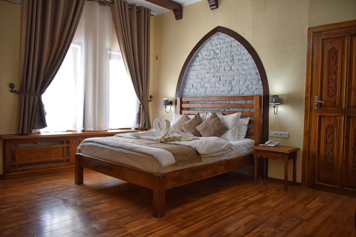 Habitación doble estándar | Ropa de cama de alta calidad y minibar