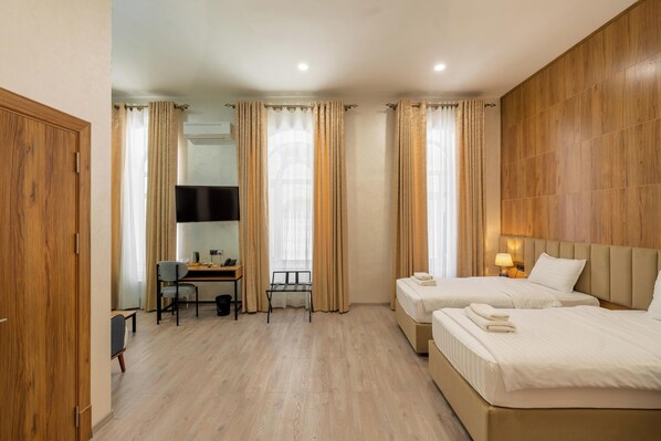 Ropa de cama de alta calidad y minibar 