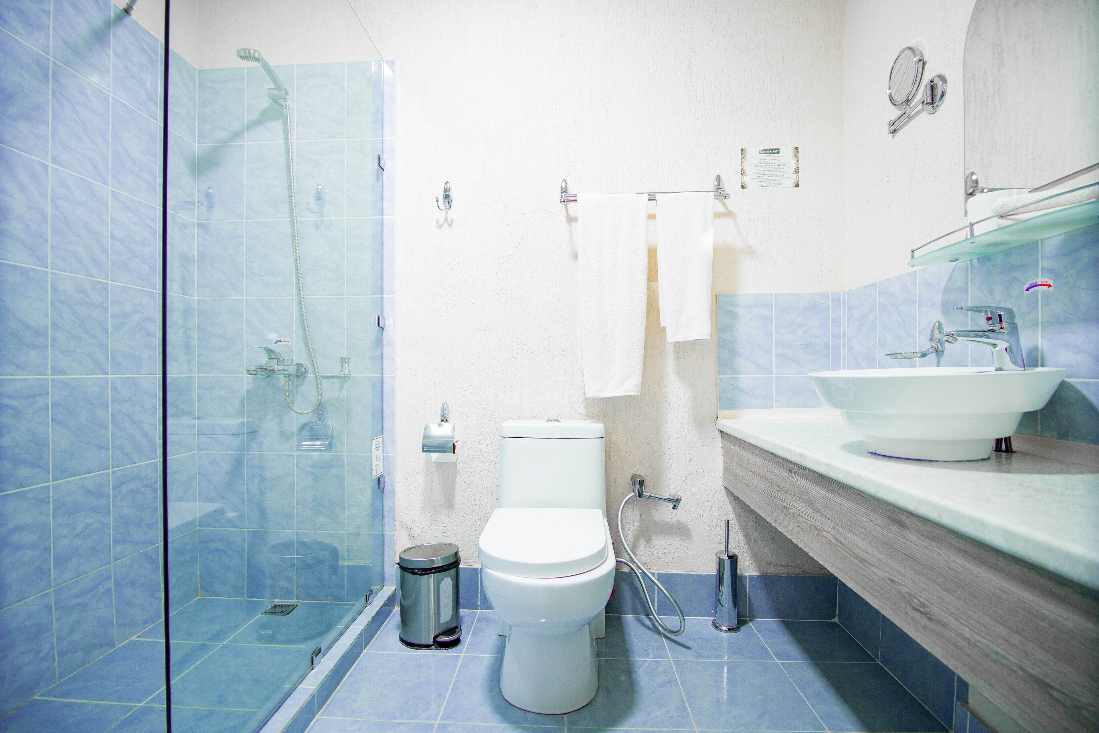 standard twin room | bathroom | shower, free toiletries, hair dryer, bathrobes