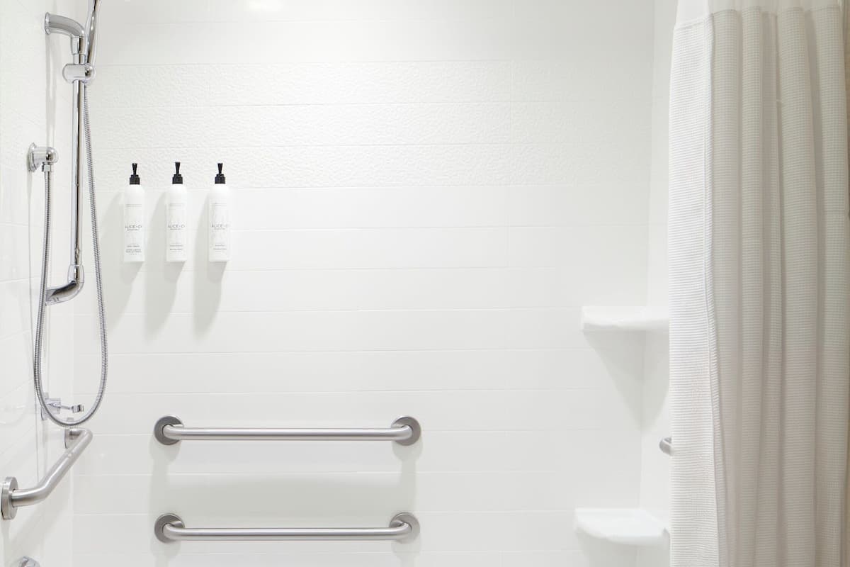 executive suite, 1 bedroom (mobility accessible, tub) | bathroom | free toiletries, hair dryer, towels, soap