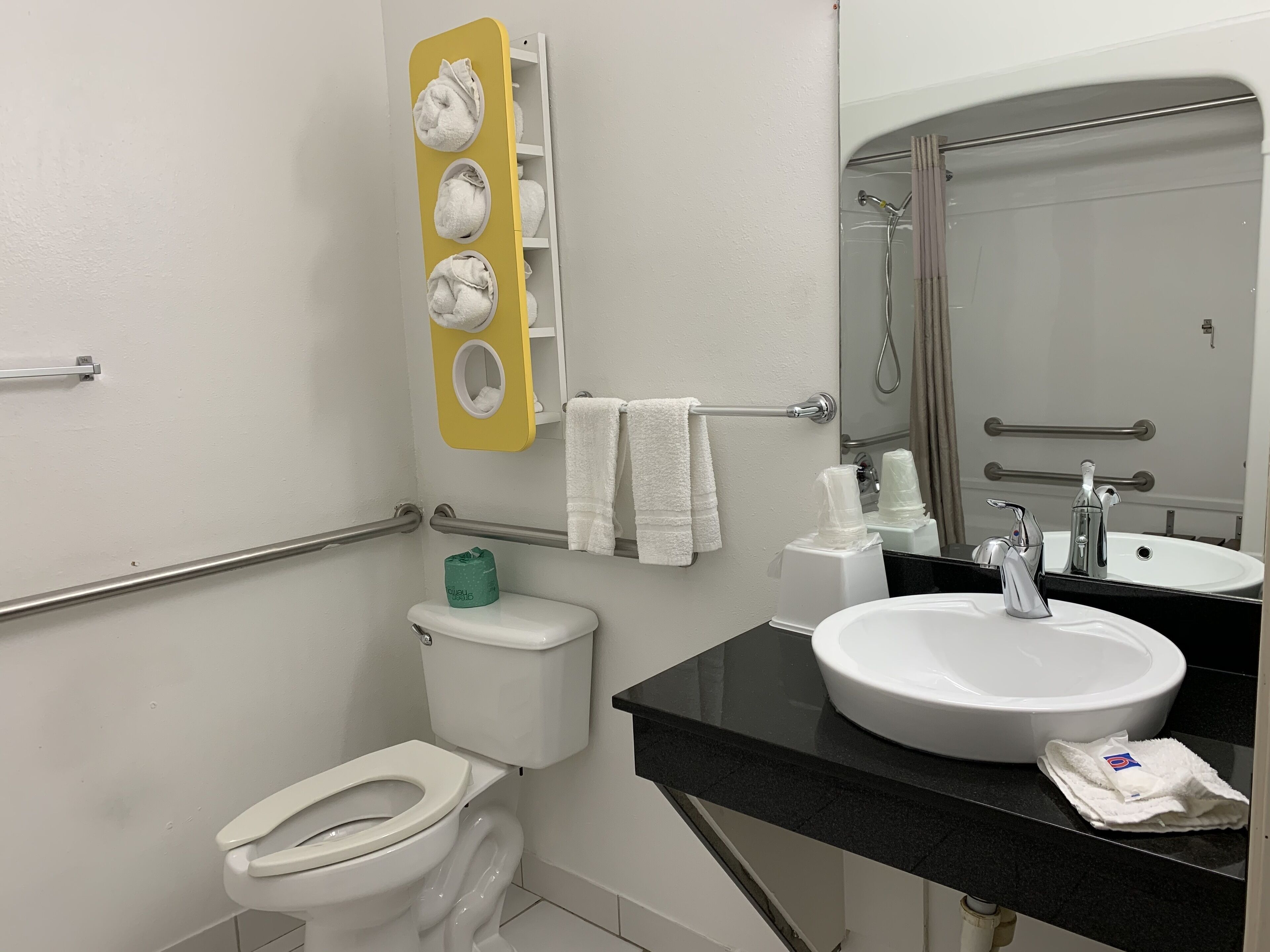 Combined shower/tub, towels, soap, toilet paper