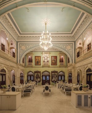 Breakfast, lunch, dinner served; Indian cuisine, garden views