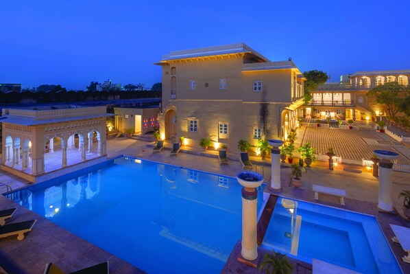 Outdoor pool, open 6:00 AM to 8:00 PM, sun loungers