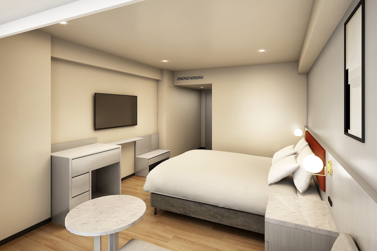 Premium kamer, 1 kingsize bed | Luxe beddengoed, een kluis op de kamer, geluiddichte muren