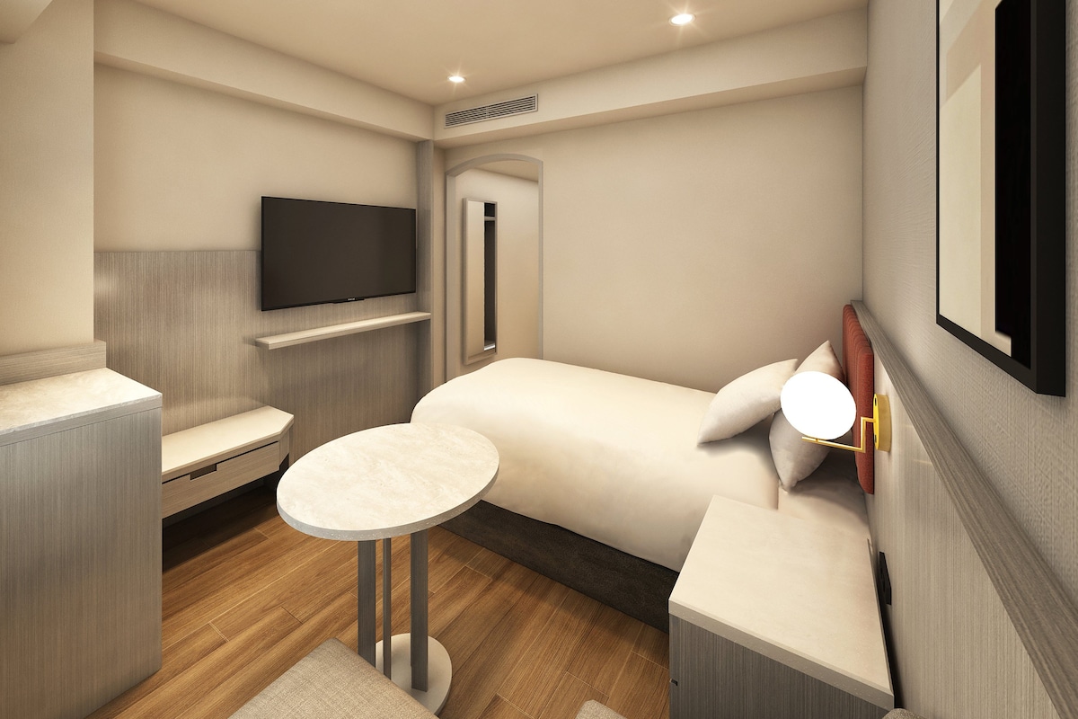 Luxe beddengoed, een kluis op de kamer, geluiddichte muren