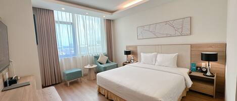 Premium bedding, down comforters, minibar, in-room safe