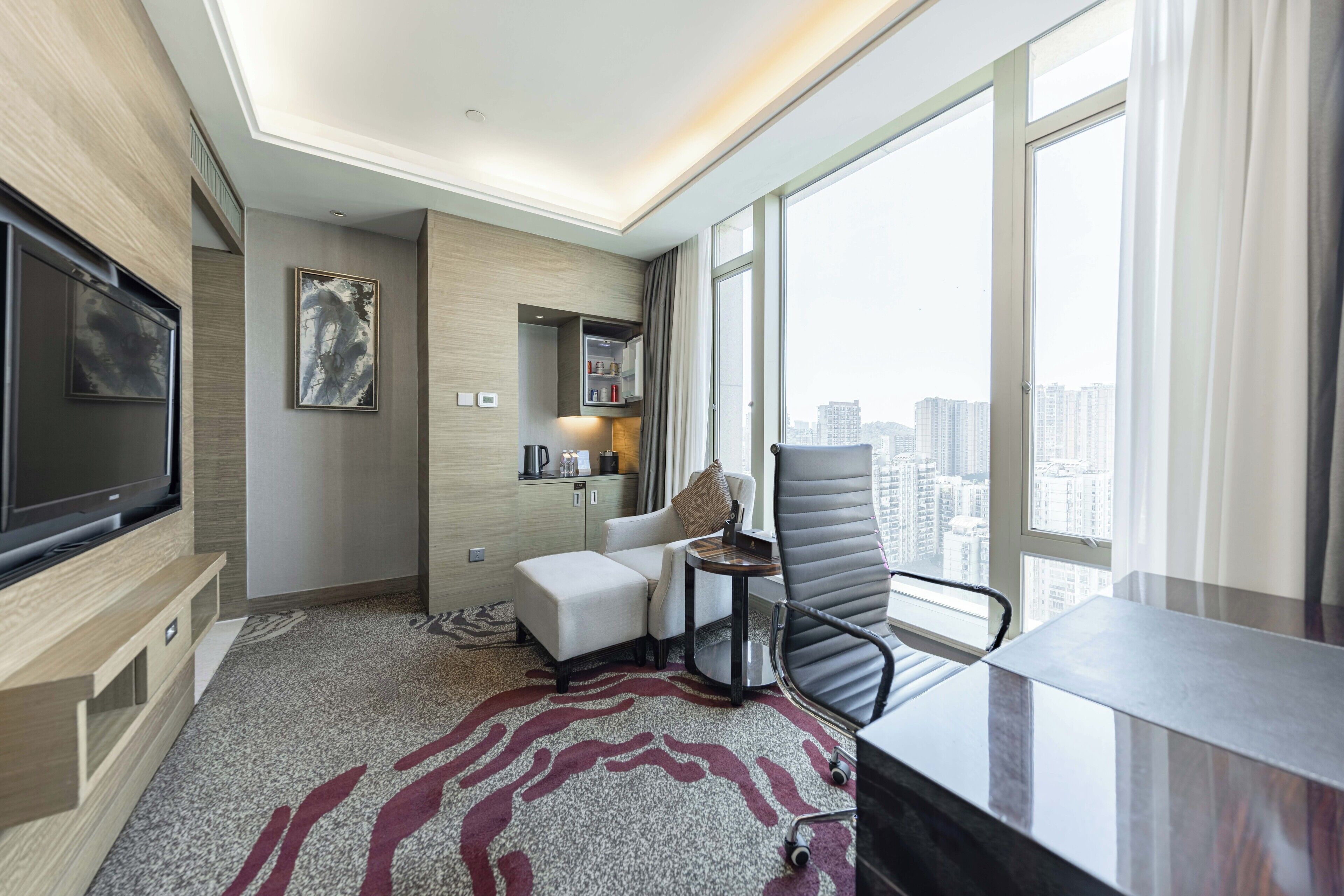 business suite, 1 queen bed | living area | tv