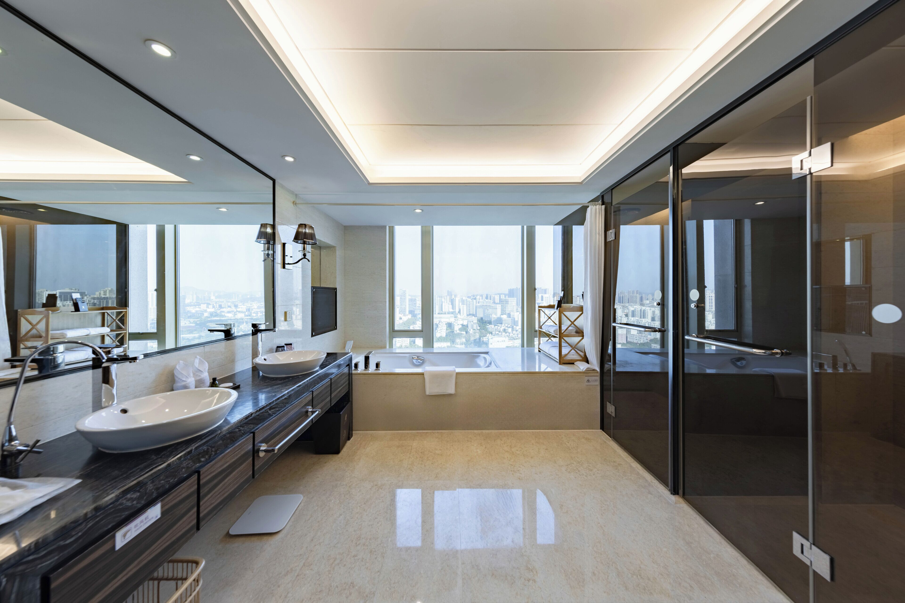 separate bathtub and shower, deep-soaking bathtub, rainfall showerhead