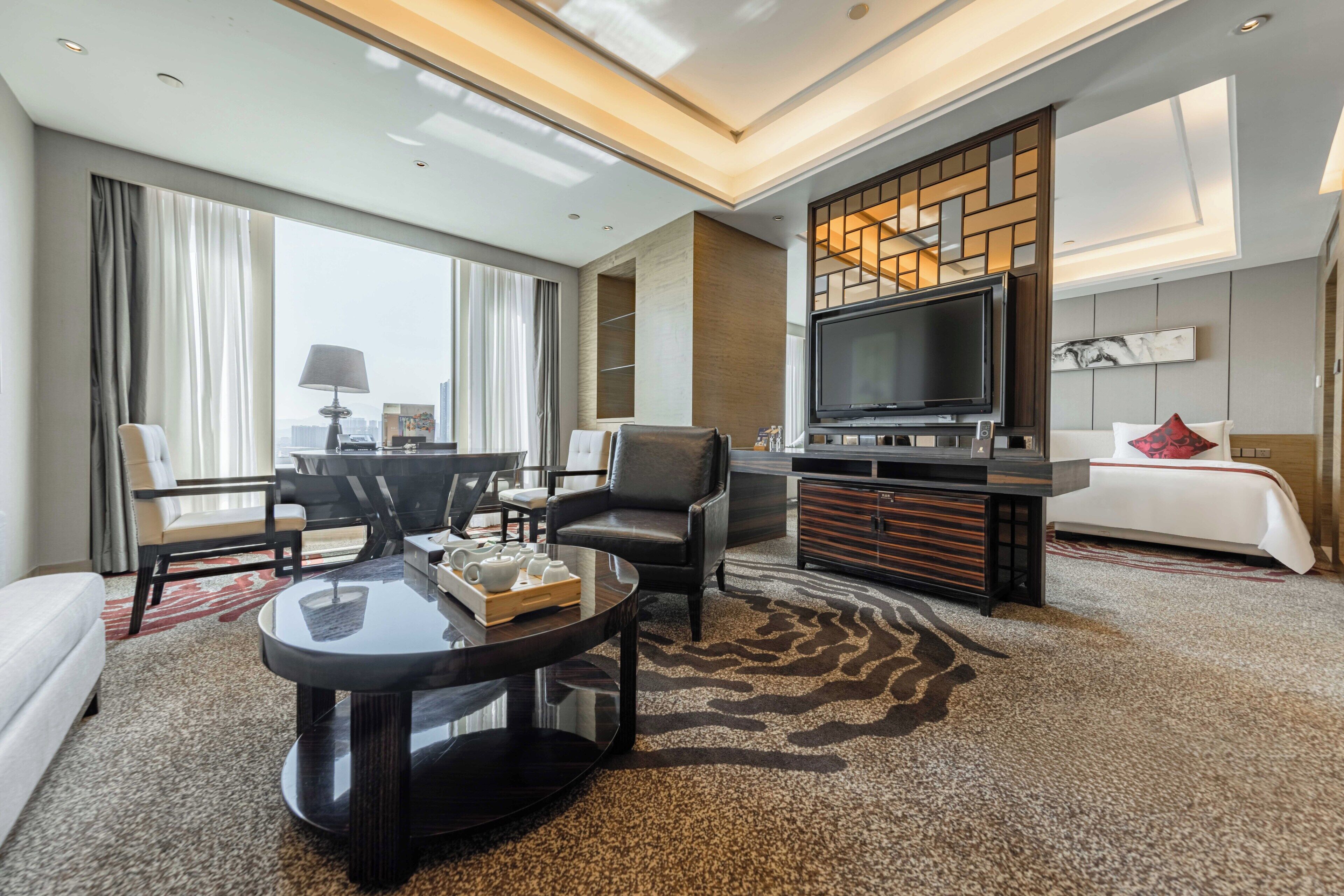 superior suite, multiple beds | living area | tv