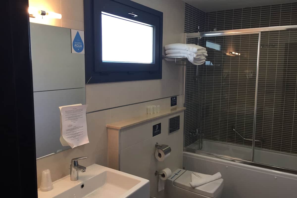 family room | bathroom | shower, free toiletries, hair dryer, towels