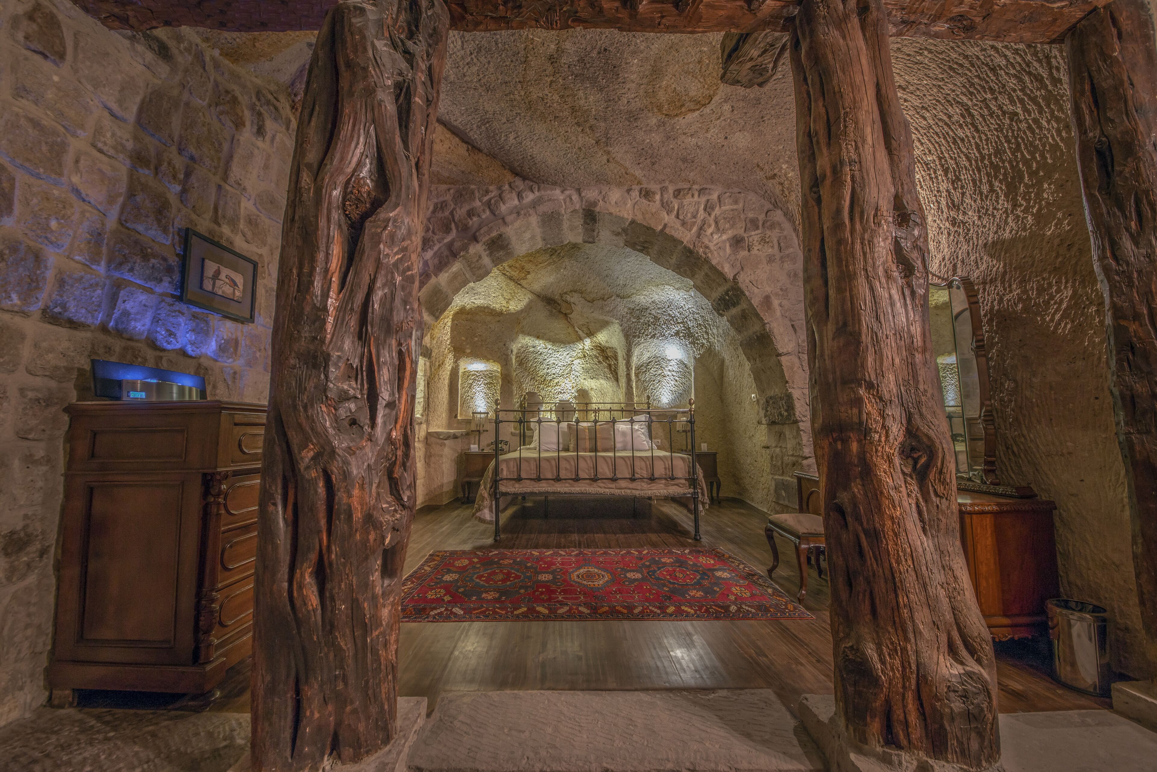 honeymoon cave suite | premium bedding, minibar, in-room safe, individually decorated