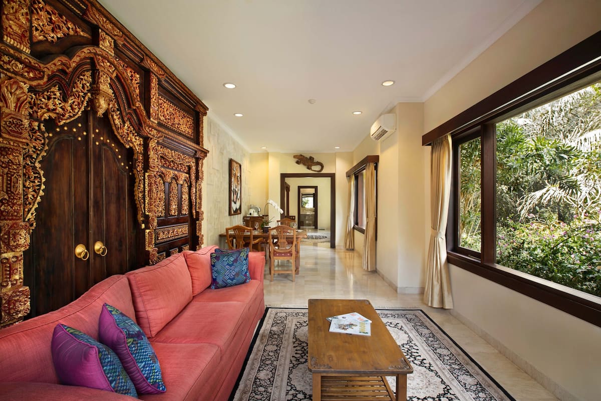One Bedroom Jungle Suite | Living area | Flat-screen TV