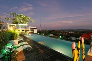 Outdoor pool, pool umbrellas, pool loungers