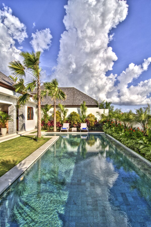 Outdoor pool, pool umbrellas, sun loungers