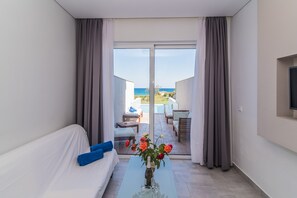 Executive Suite, Private Pool, Sea View | Living area | 32-inch Smart TV with satellite channels, TV - Belussi Beach Hotel & Suites (Zakynthos)