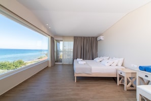 Deluxe Suite, Sea View | 1 bedroom, in-room safe, individually decorated, individually furnished