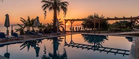 Outdoor pool, pool umbrellas, pool loungers