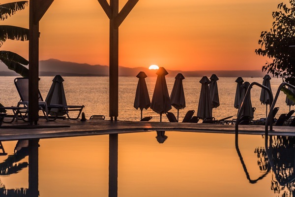 Outdoor pool, pool umbrellas, sun loungers