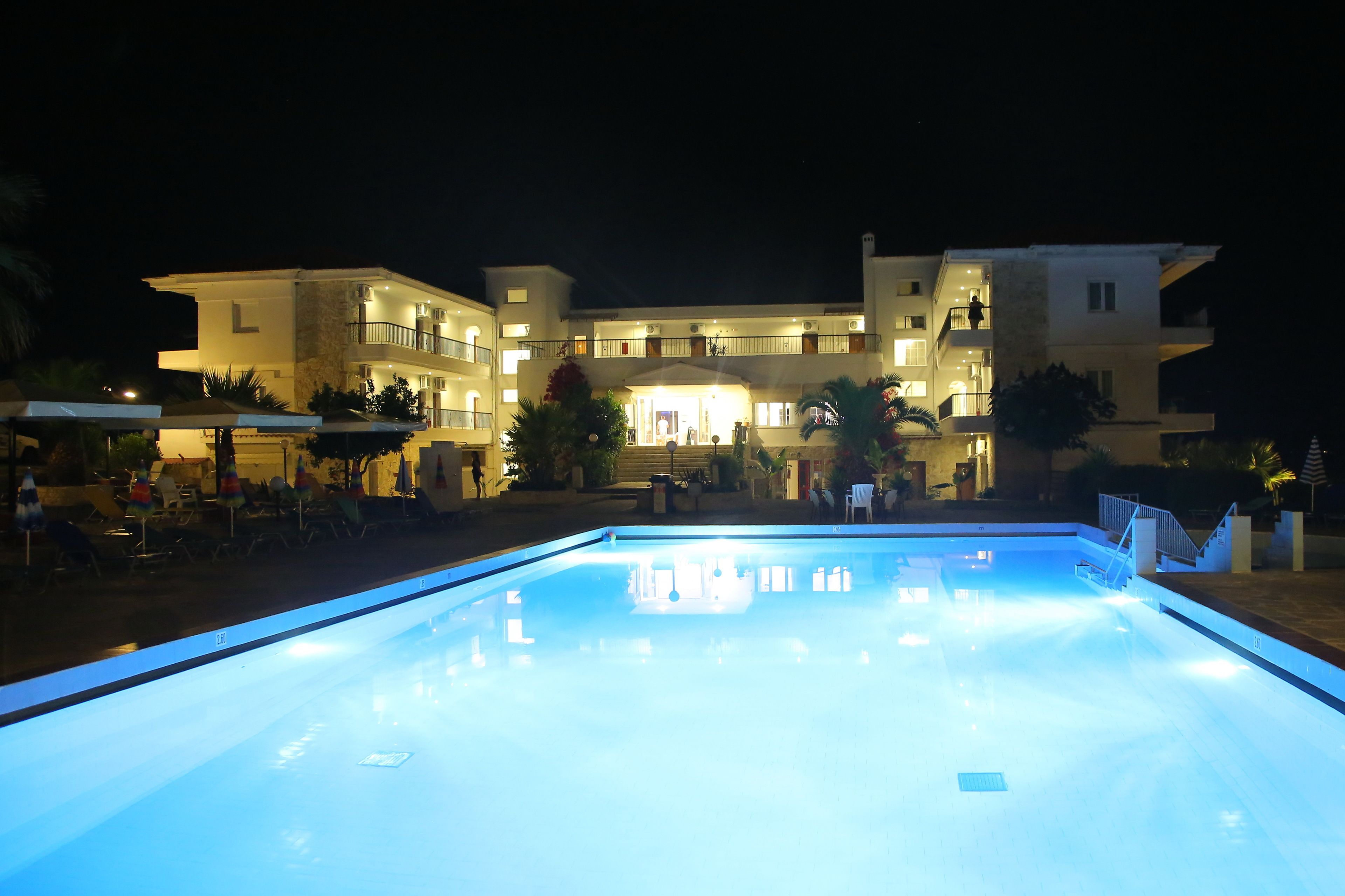 outdoor pool, pool umbrellas, pool loungers