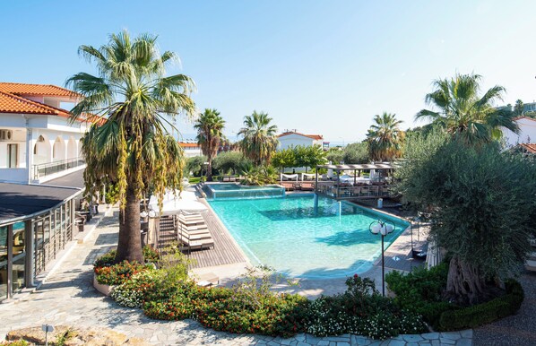 Seasonal outdoor pool, pool umbrellas, pool loungers