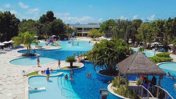 Outdoor pool, free pool cabanas, pool umbrellas
