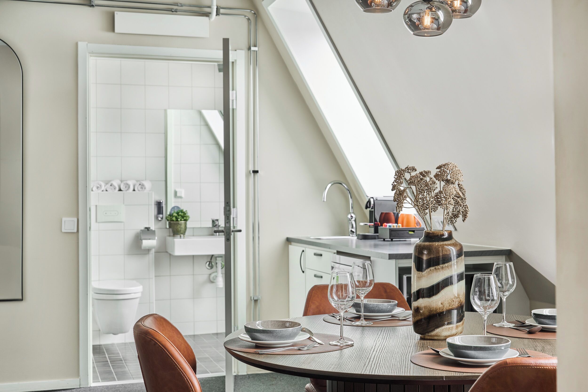 studio suite | bathroom | shower, hair dryer, towels