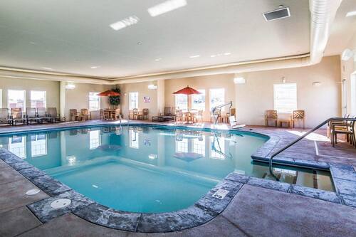 Indoor pool, open 6:00 AM to midnight, pool loungers