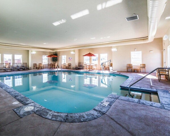 Indoor pool, open 6:00 AM to midnight, pool loungers