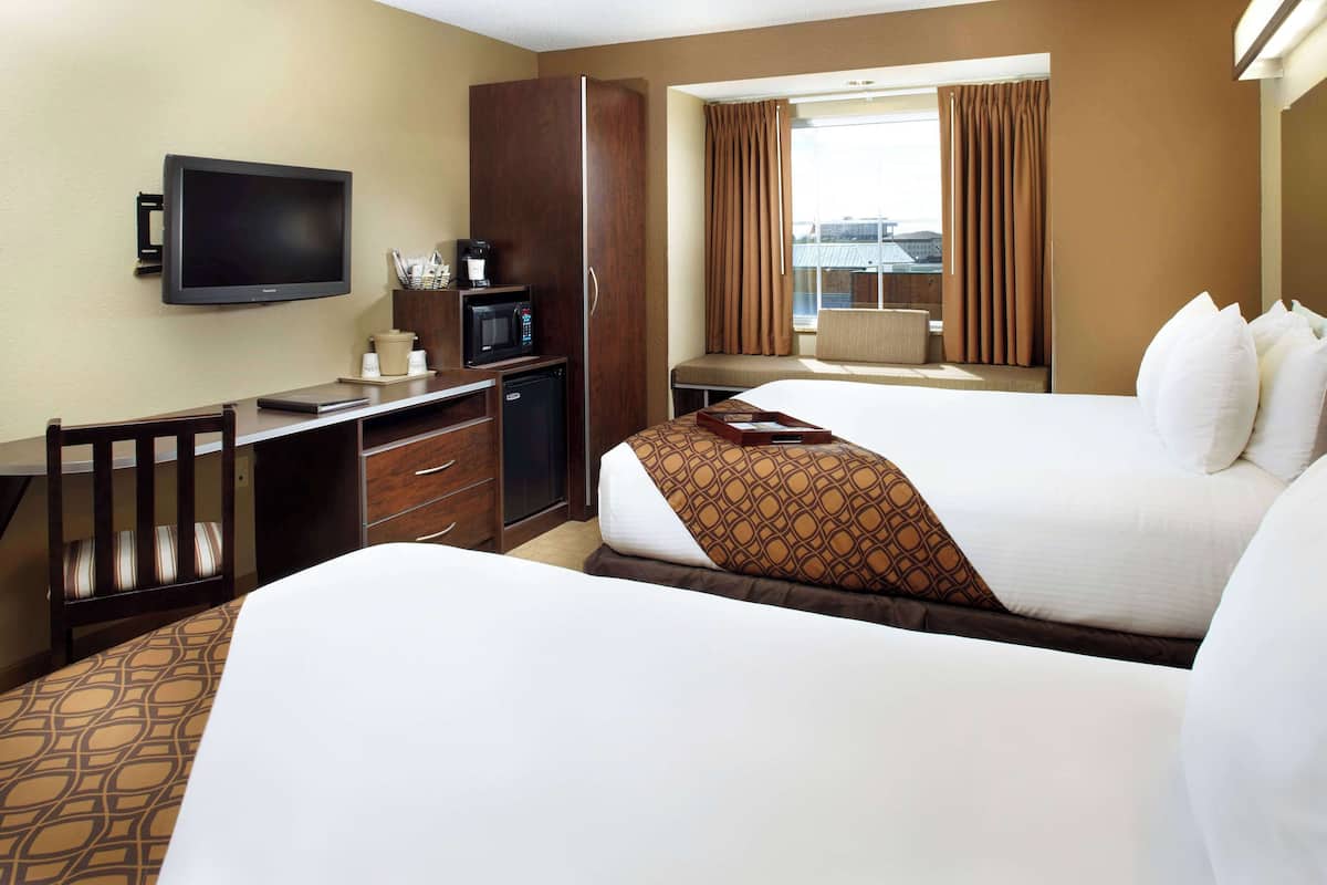 Room, 2 Queen Beds, Non Smoking | In-room safe, desk, blackout drapes, iron/ironing board