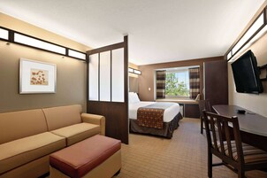 Suite, Multiple Beds, Non Smoking | In-room safe, desk, blackout drapes, iron/ironing board