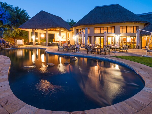 Outdoor pool, free pool cabanas, pool umbrellas