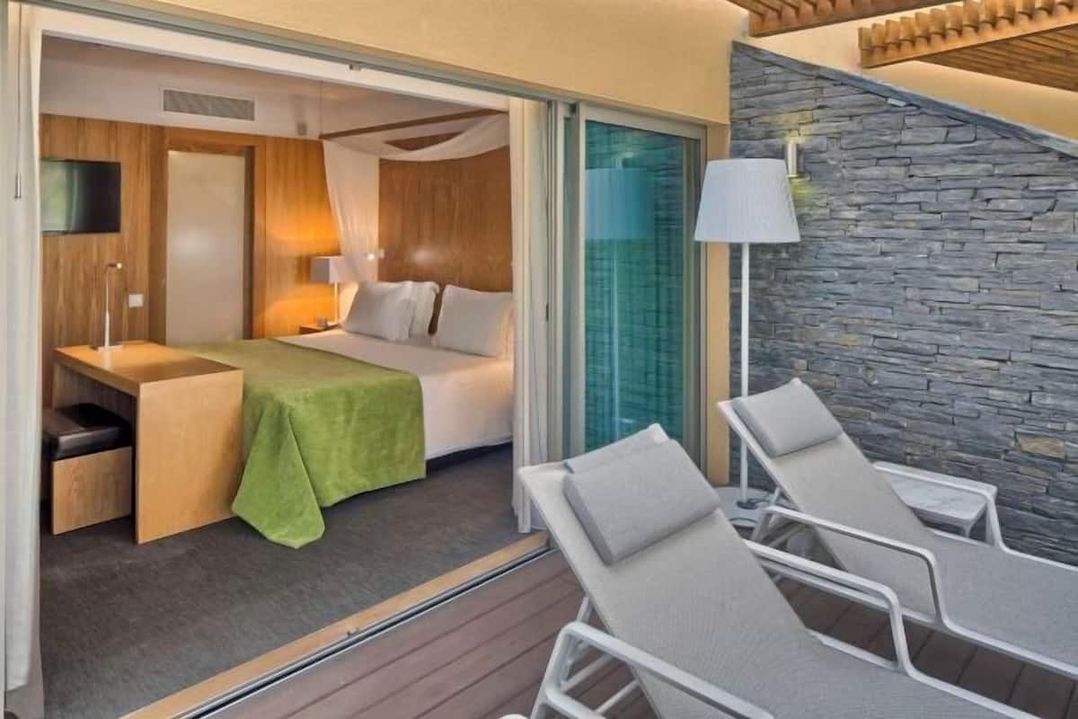 1 habitación, ropa de cama de alta calidad y minibar